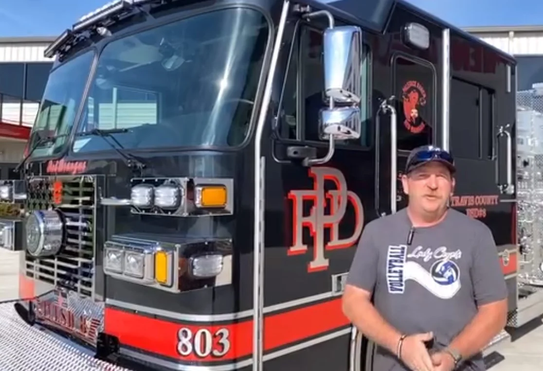 Battalion Chief Chad Kubin conducts a walk-around for Pedernales Fire Department's new Sutphen pumper.
